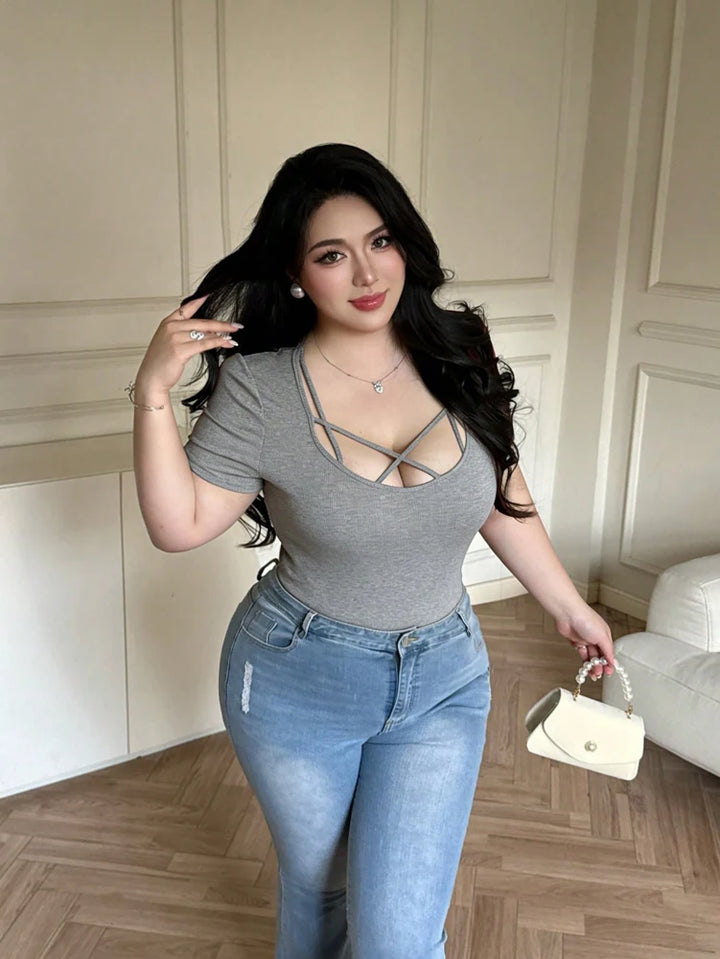 Grey short-sleeve crisscross cutout top with strappy neckline, curve fit