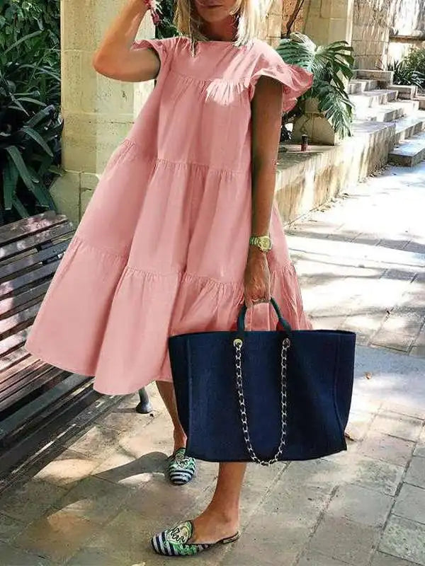 Blush pink tiered midi dress with fluttery short sleeves and ruffle neckline