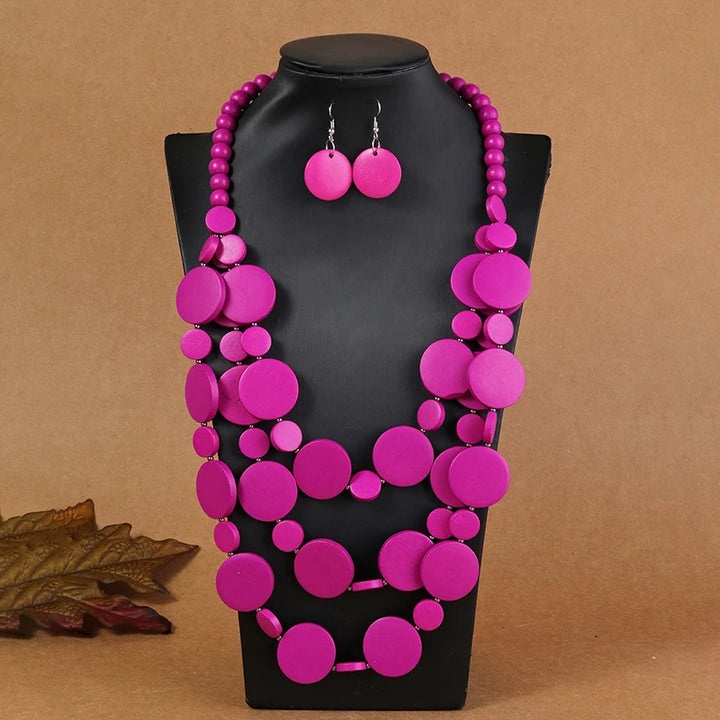 Fuchsia/pink multilayer disc beaded necklace set with matching drop earrings