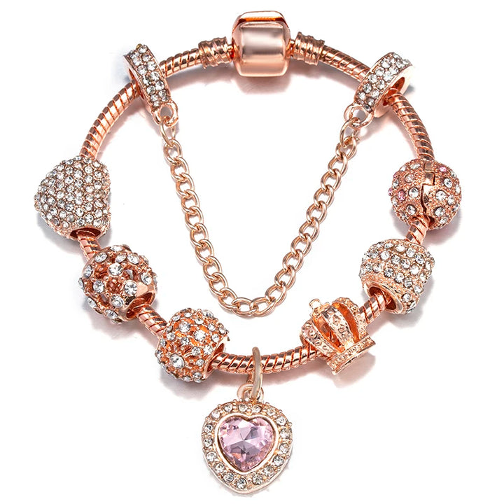 Rose gold charm bracelet with pink heart pendant and glitter bead charms