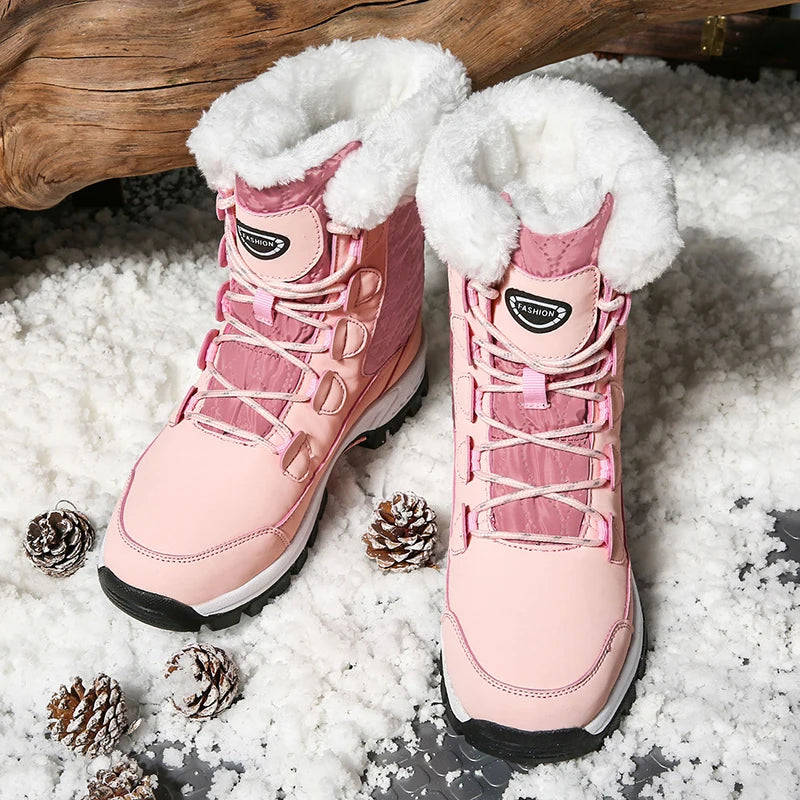 Women's rose pink mid-calf lace-up snow boots with thick fleece lining and grippy outsole