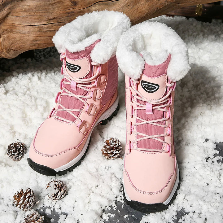 Women's rose pink mid-calf lace-up snow boots with thick fleece lining and grippy outsole