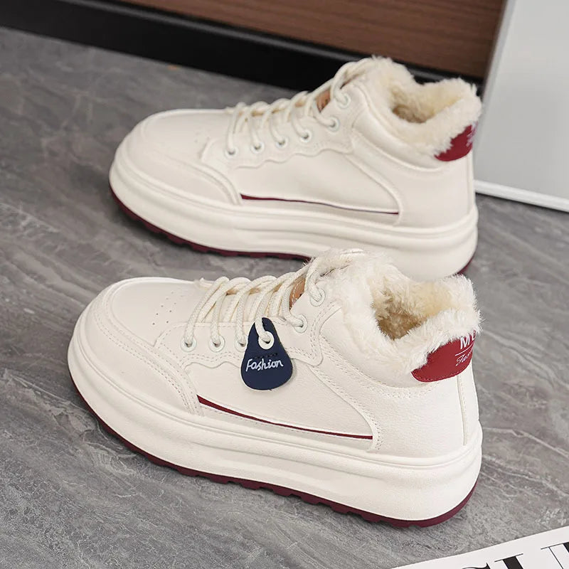 White lace-up platform sneakers with plush fur lining and faux leather upper