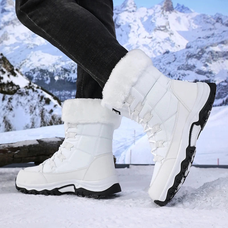 Women’s winter snow boots in white with lace-up front, plush lining, and rugged outsole.