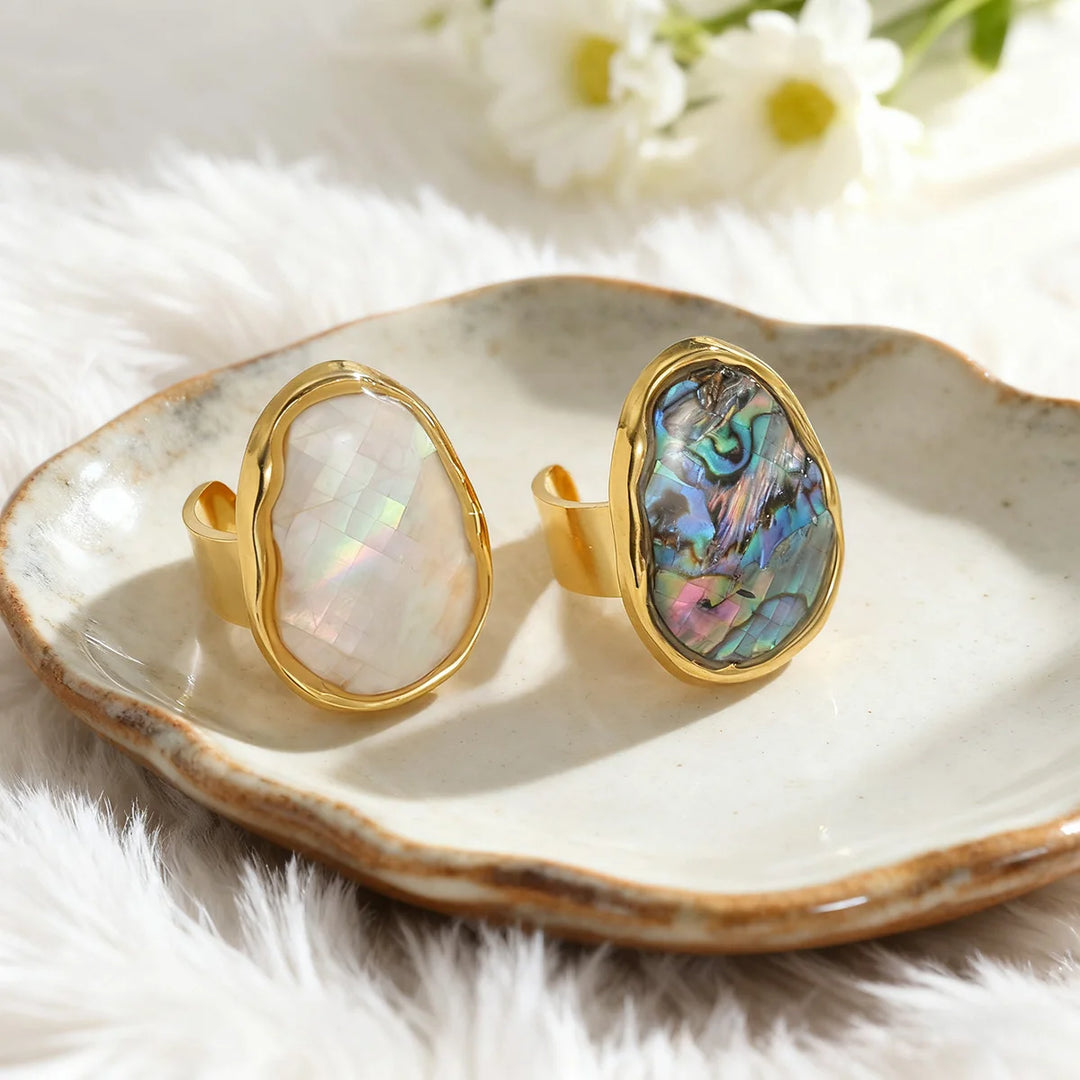 Gold open ring with oval abalone shell inlay, iridescent pink-blue, split band