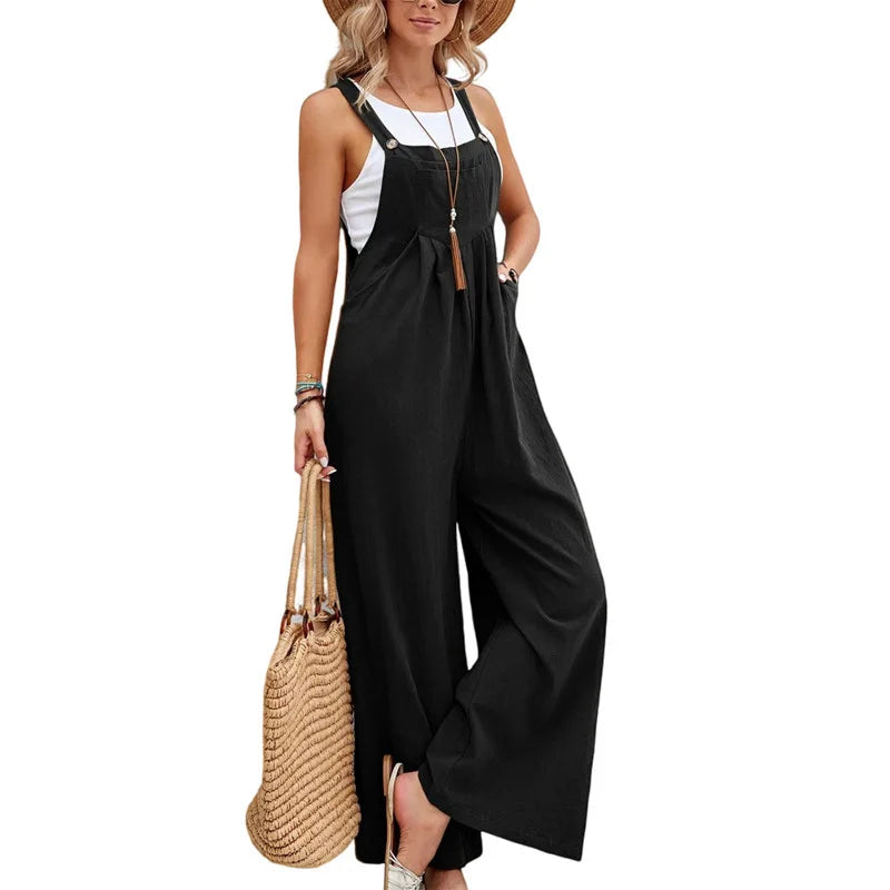Black sleeveless jumpsuit with adjustable straps, wide legs, and front bib pocket