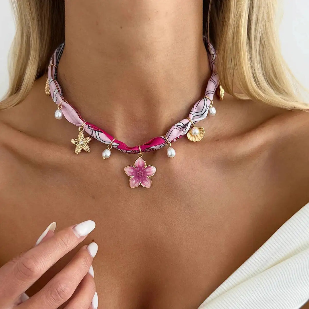 Boho heart pendant necklace with pink flower charm and pearl-like bead drops