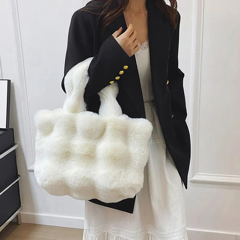 Off-white faux fur bucket handbag with short handles and structured top