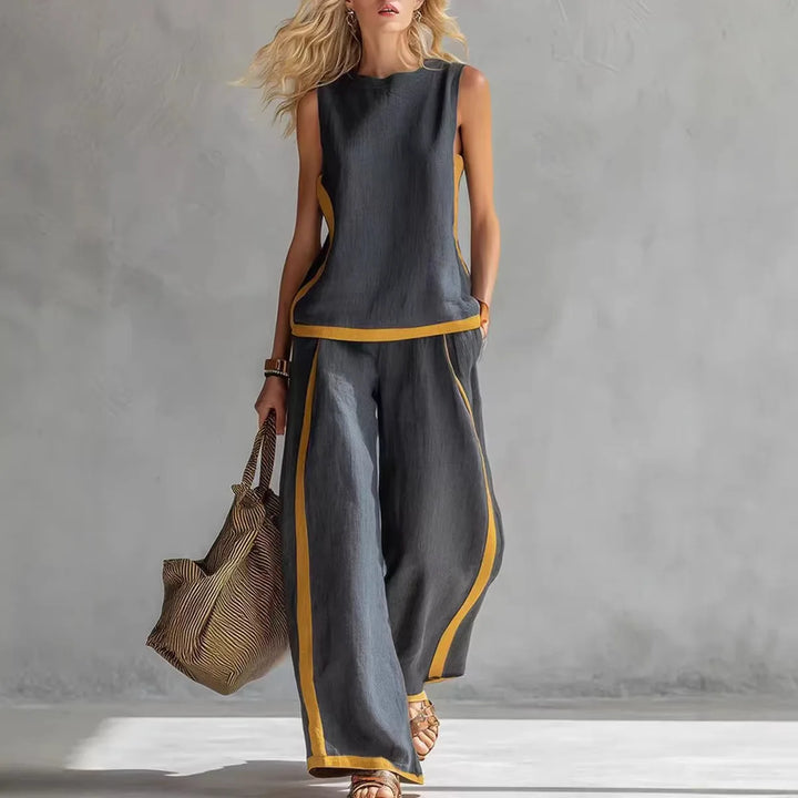 Dark sleeveless tank and wide-leg pants set with contrast yellow trim.