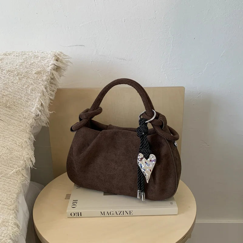 Small suede crossbody handbag, brown, top handles and heart key charm
