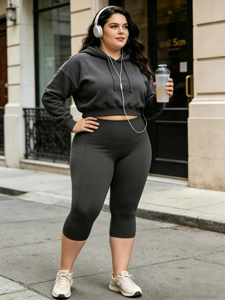High-waist plus-size capri leggings with side pockets, dark gray