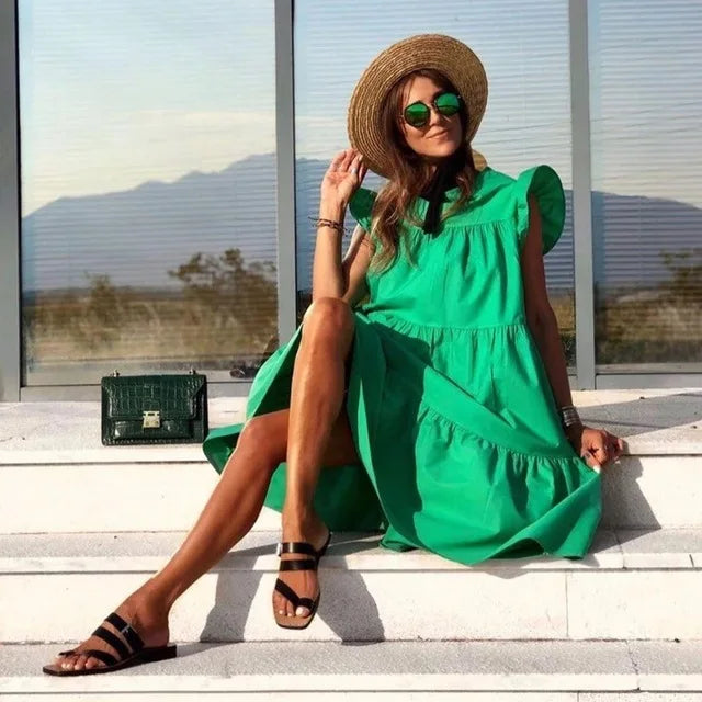 Bright green midi dress with puff sleeves and gathered tiered skirt