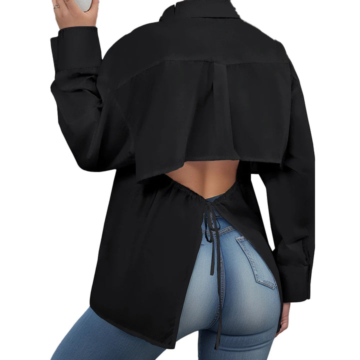 Person wearing a black jacket with a cutout design on a white background