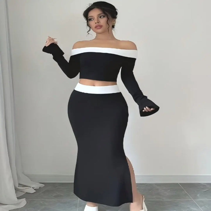Front view: off-shoulder black crop top with white trim and mermaid slit skirt
