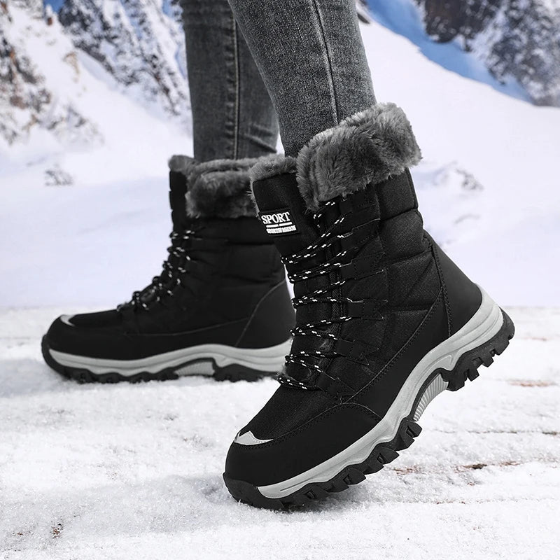 Women’s winter snow boots in black with lace-up front, plush cuff, and grippy tread.