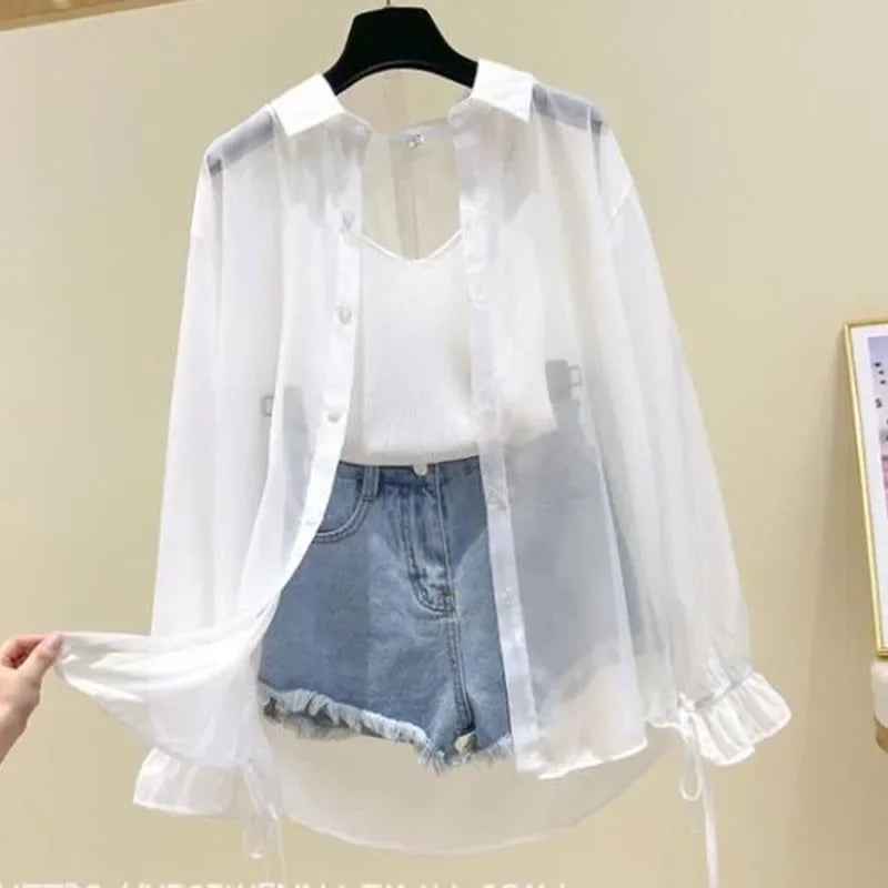 White sheer button-up long sleeve shirt with ruffled cuffs and drawstring hem