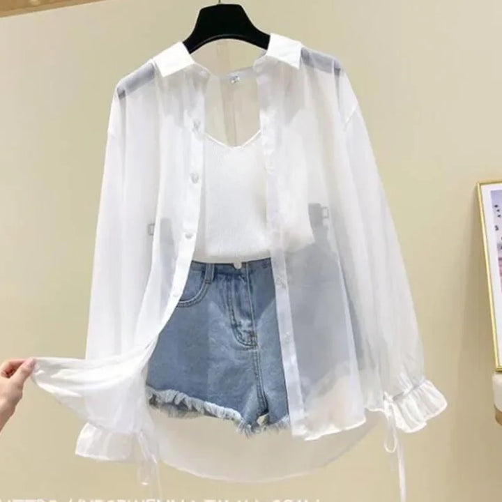 White sheer button-up long sleeve shirt with ruffled cuffs and drawstring hem