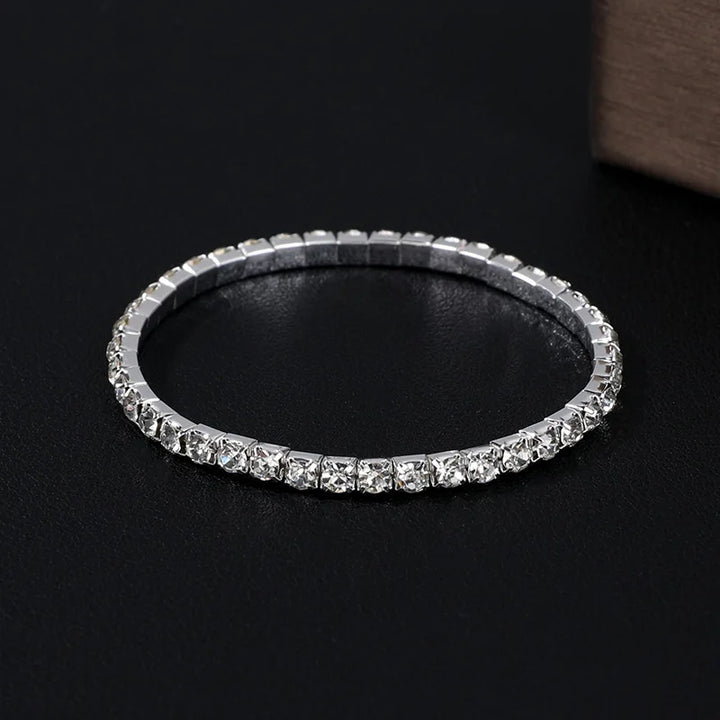 Clear zircon tennis bracelet with rectangular stone links in silver-tone metal