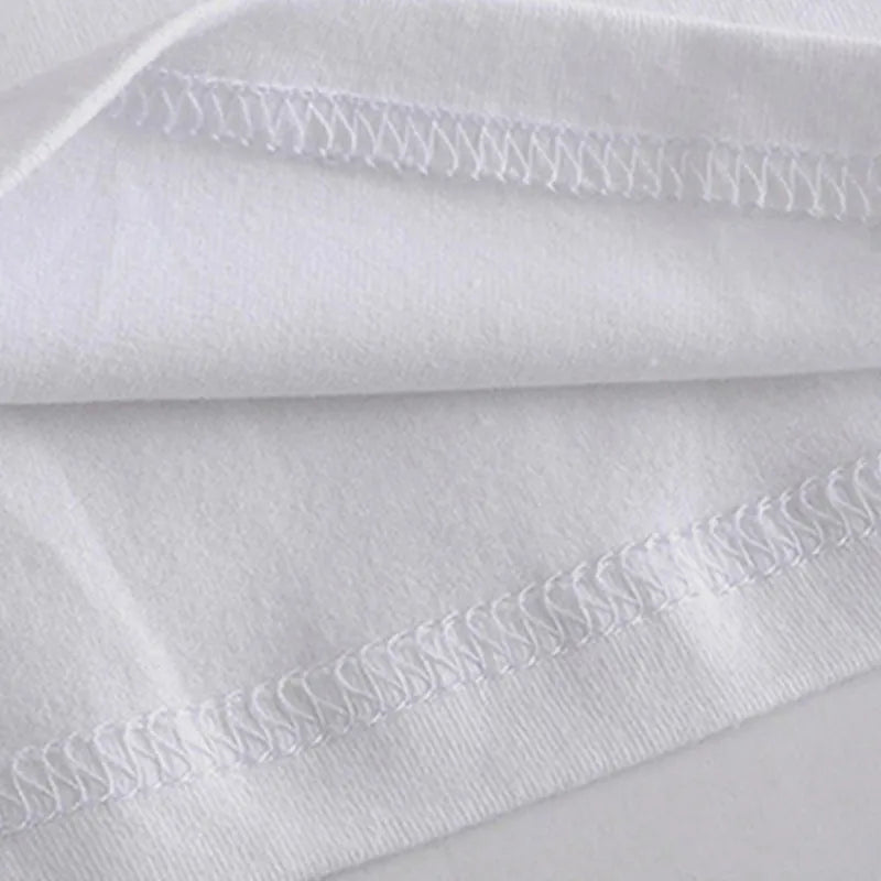 White tee neckline seam and top hem stitching close-up