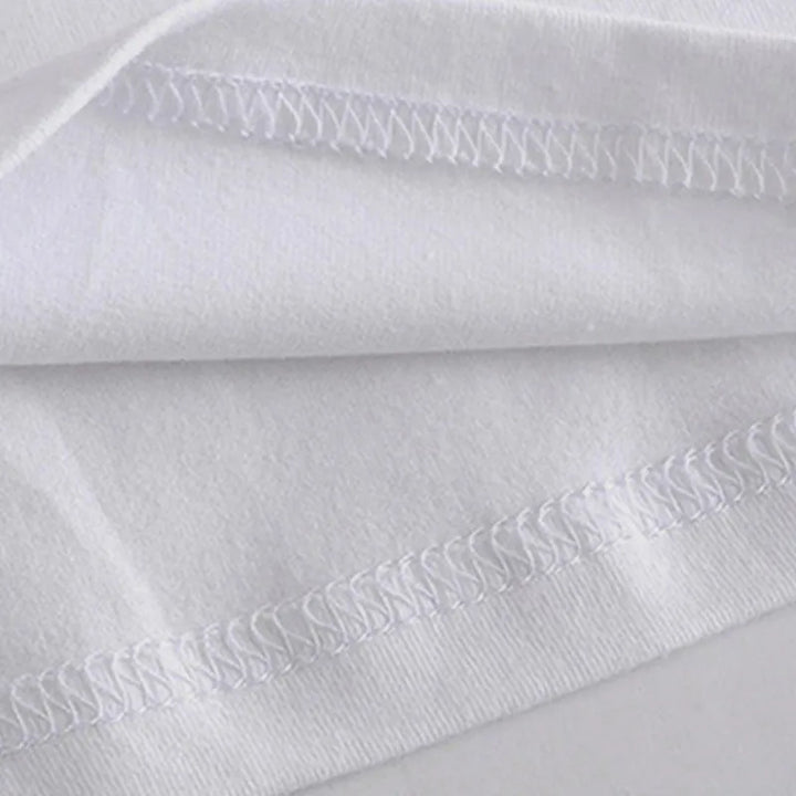 White tee neckline seam and top hem stitching close-up