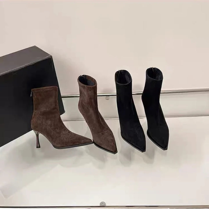 Set of pointed-toe ankle boots with slim heels in brown and black pairs