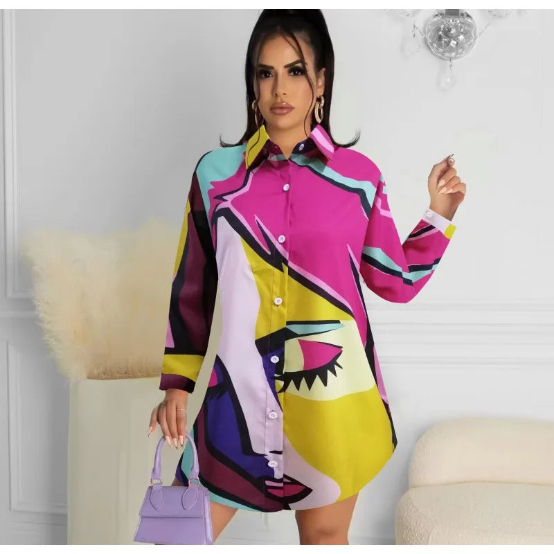 Woman wearing a colorful patterned dress in an indoor setting.