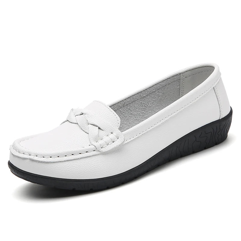 White shoe with a black sole on a white background