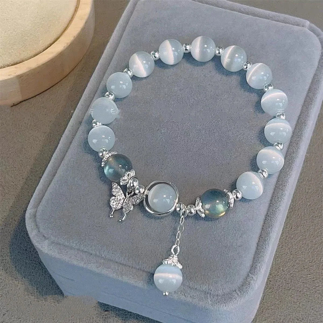 Women's light-blue crystal beaded elastic bracelet with star charms and dangling chain