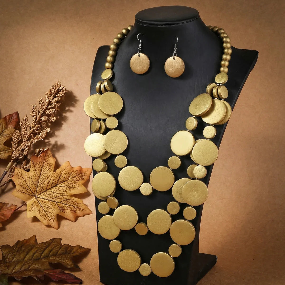 Gold-tone multilayer disc beaded necklace with matching round drop earrings