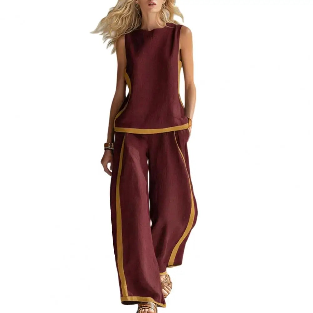 Dark red sleeveless vest and wide-leg pants set with gold trim, front view
