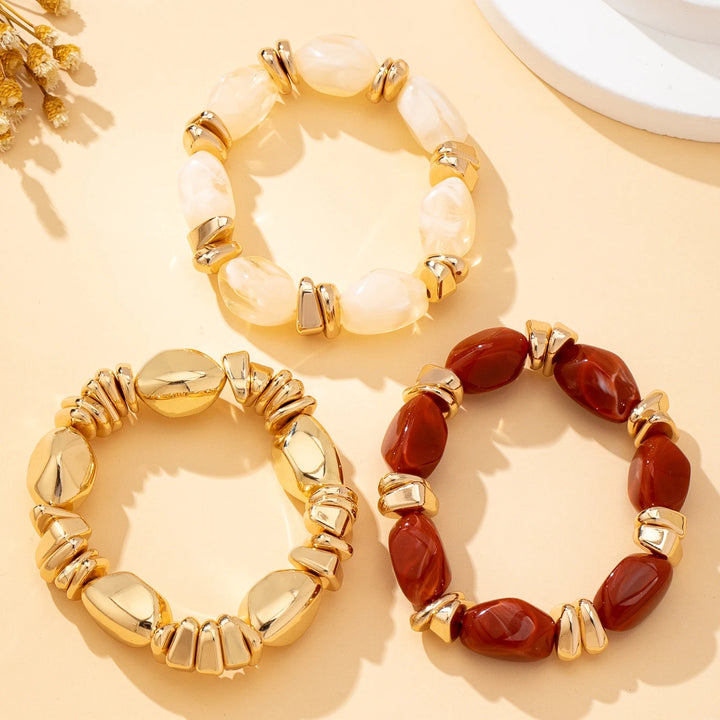 Gold-tone acrylic bead bracelets set, with cream and deep red irregular beads
