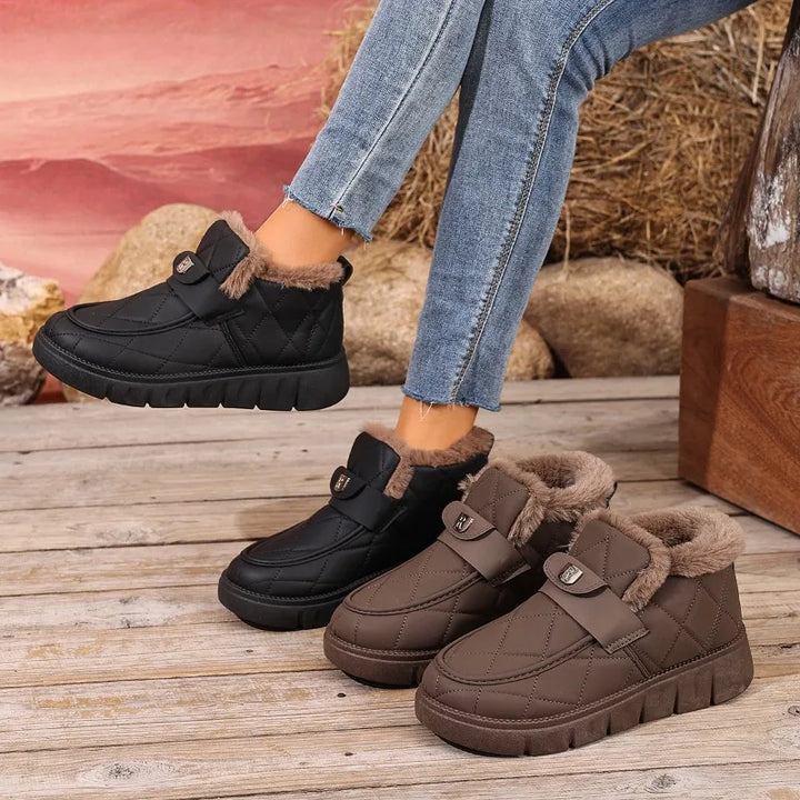 Black and brown quilted ankle boots with faux fur lining and hook-loop straps