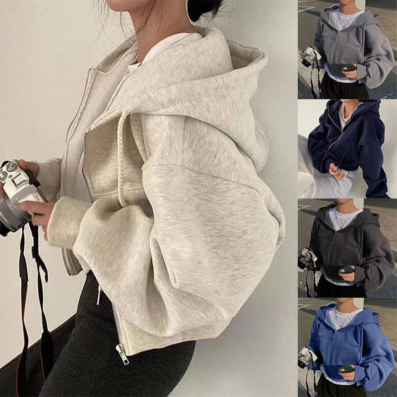 Light gray zip-front hooded sweatshirt with drawstring hood and pouch pocket