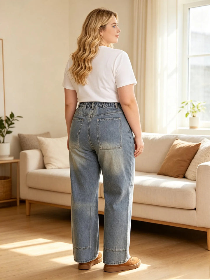 Light blue denim cargo jeans with drawstring waist and relaxed straight wide fit