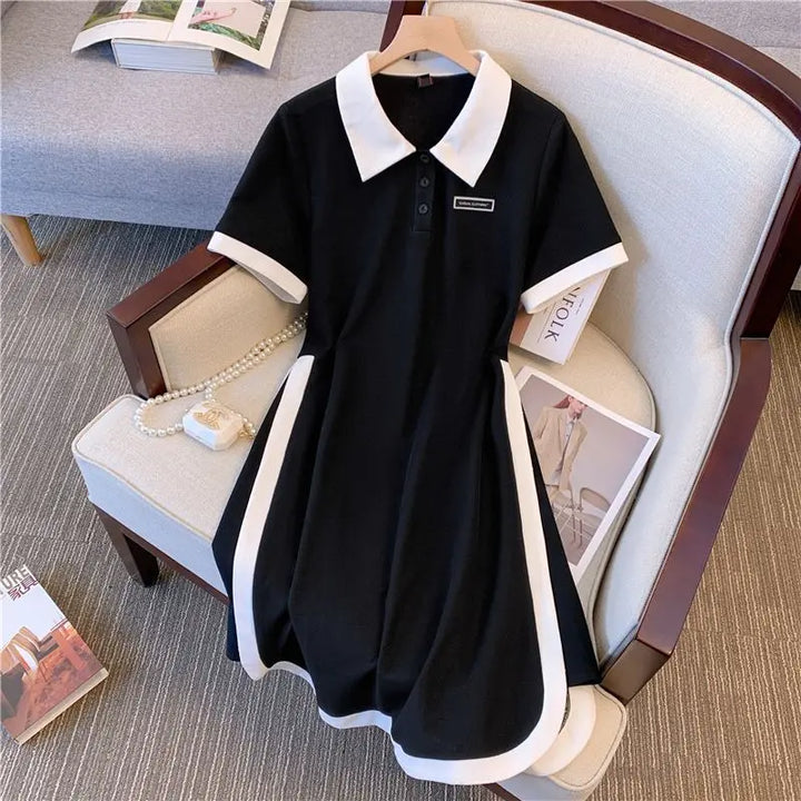Black polo dress with white-trim collar and sleeves, A-line skirt