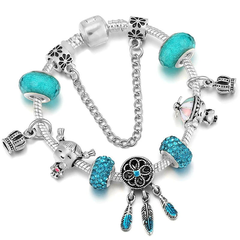 Silbernes Schlangenketten-Armband mit türkisfarbenen Glasperlen, Traumfänger-Charm und Tier-Charms