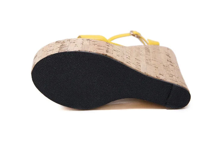 Eilyken women’s yellow wedge platform sandal outsole with cork-style heel and straps