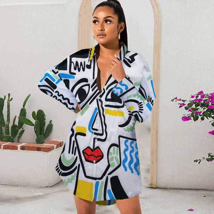 Woman wearing a colorful, abstract-patterned dress in a room with plants.