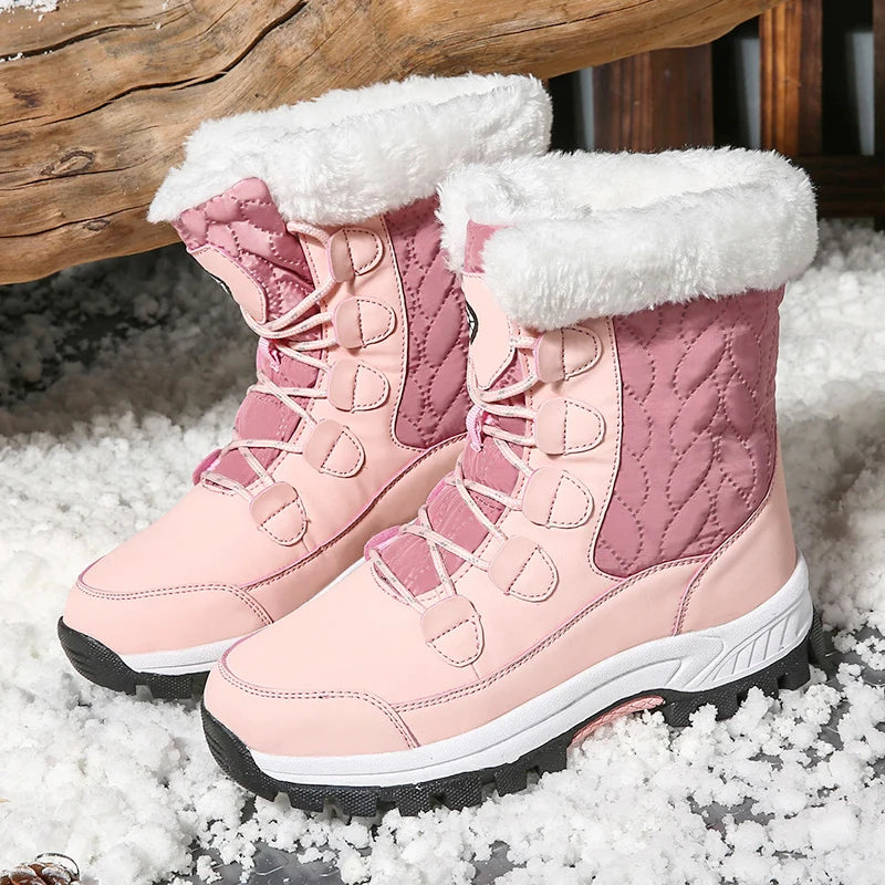 Women's pale pink mid-calf lace-up snow boots with plush fleece collar lining and grippy sole