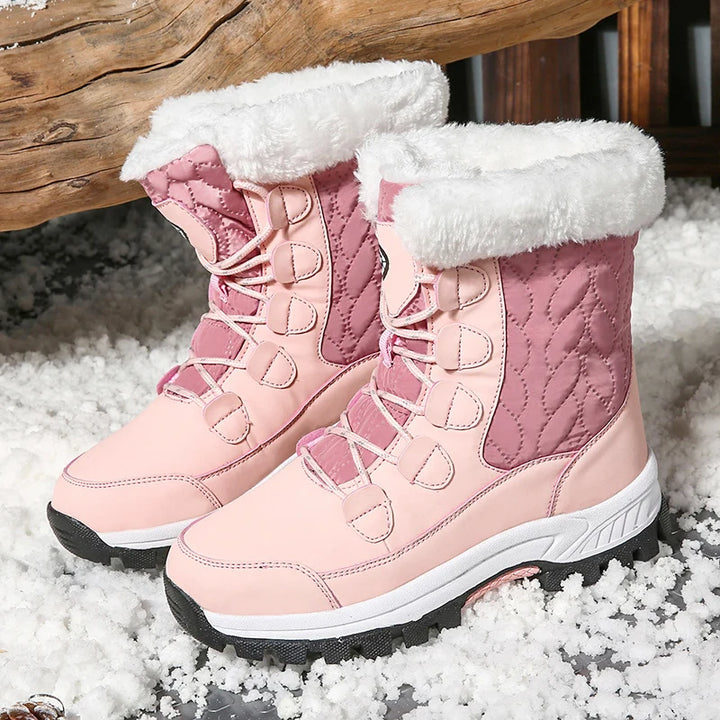 Women's pale pink mid-calf lace-up snow boots with plush fleece collar lining and grippy sole
