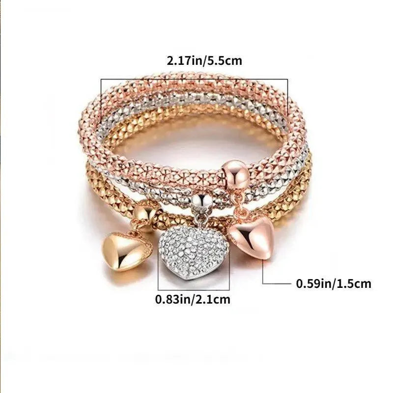 Mehrreihiges Armband in Roségold und Silber mit mehreren Anhängern