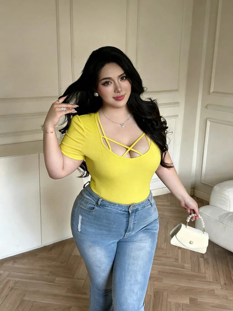 Yellow short-sleeve crisscross cutout top with strappy lattice neckline