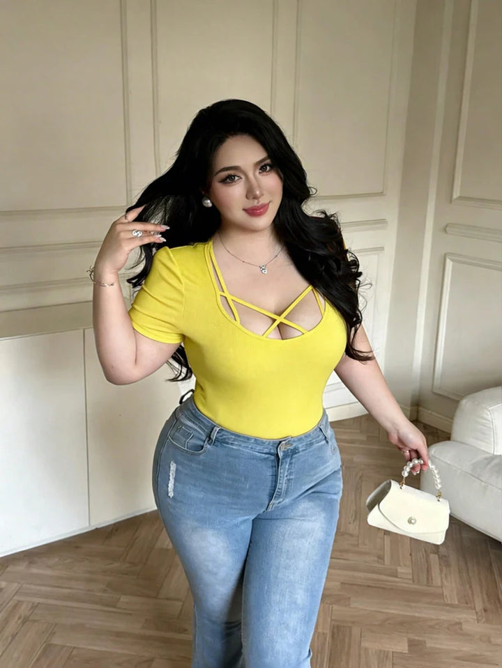 Yellow short-sleeve crisscross cutout top with strappy lattice neckline