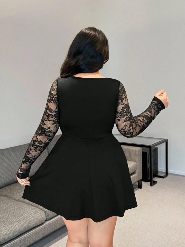 Black lace long sleeve mini dress, open back and flared skirt