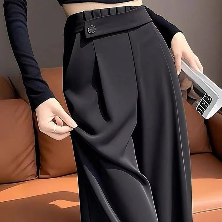 Women’s high-rise wide-leg ankle-crop pants in black, angled pleats at waistband
