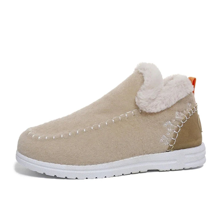 Women's beige slip-on ankle loafer with white fleece collar and white rubber sole