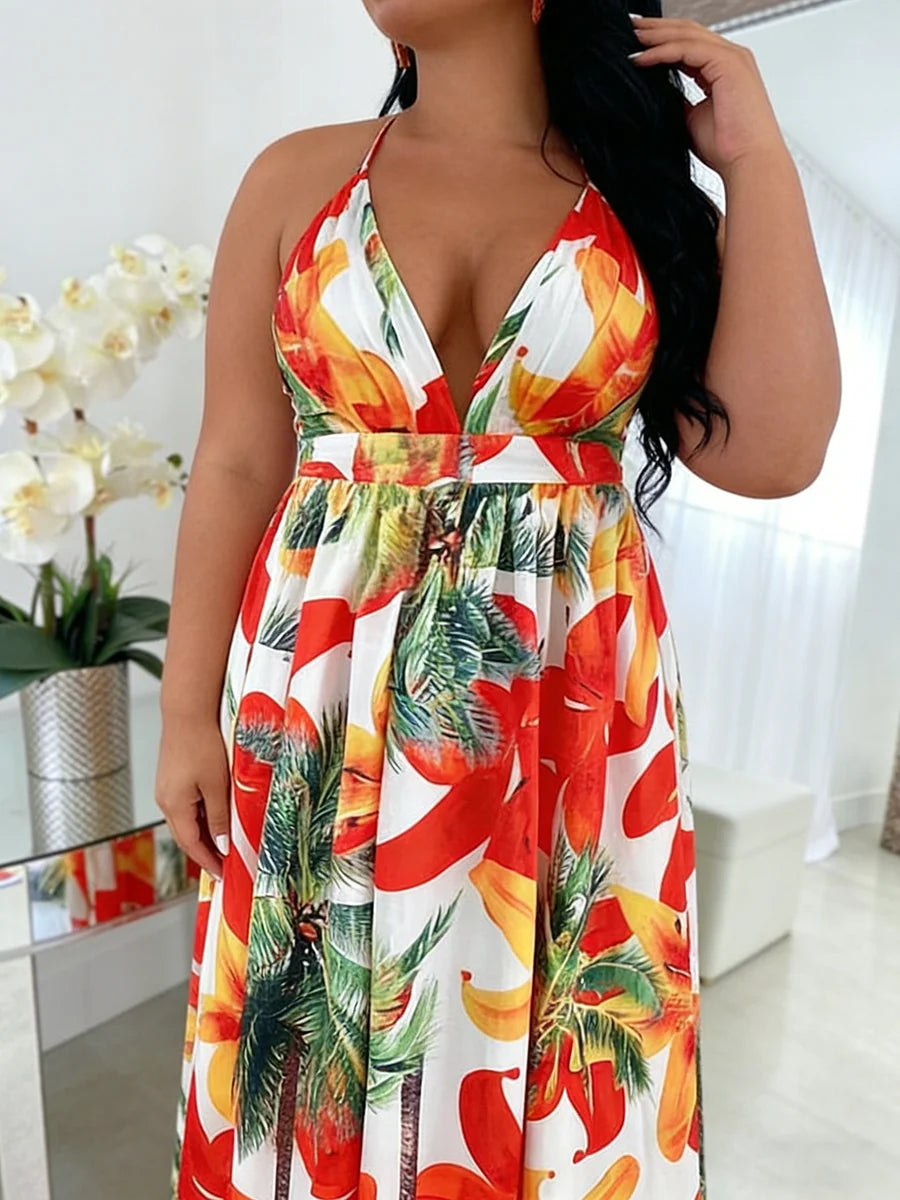 Woman wearing a colorful floral dress in a bright room.