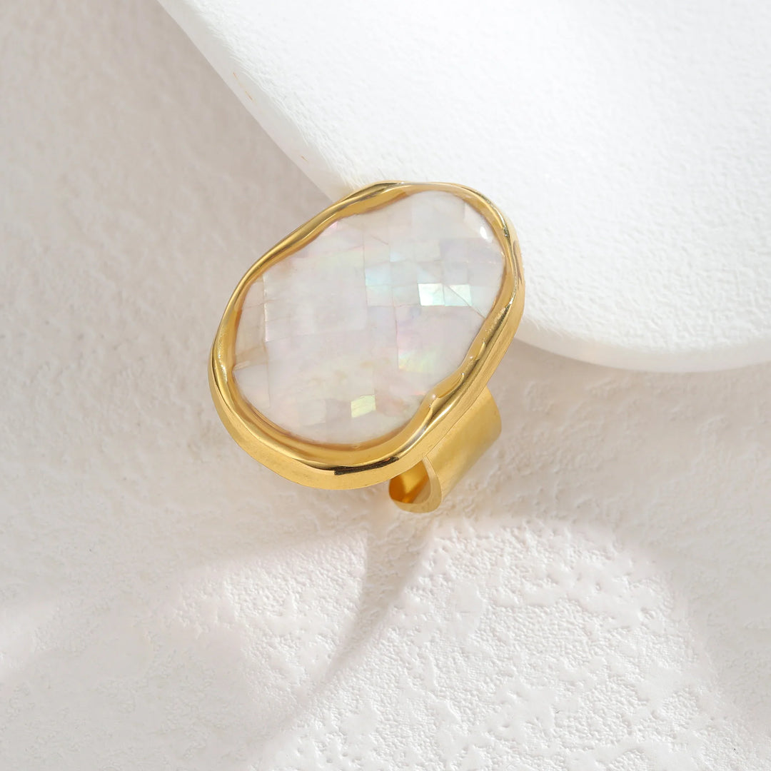 Gold open ring with oval opal-like mother-of-pearl inlay, split band, waterproof style