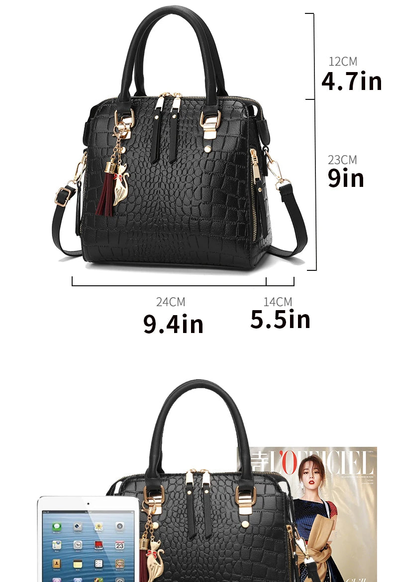 Black handbag with measurements and a magazine in the background