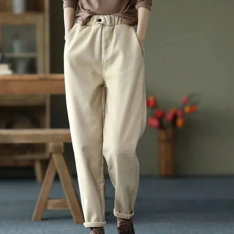 Women's Plus Size Apricot Harem Pants Styled With A Brown Top And Lace-Up Boots